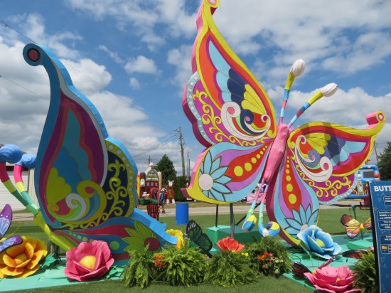 Colorful giant bvutterfly statues.