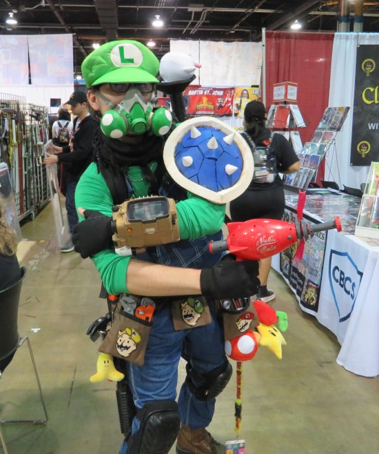 cosplay: Mario's brother Luigi but with Fallout gear, including pics of Vault Boy's face wearing Luigi's mustache.