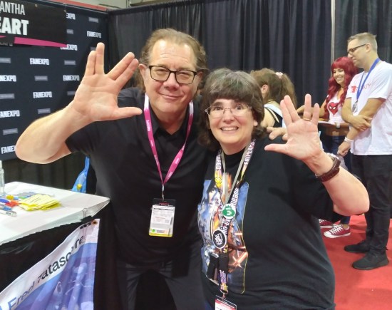 Anne with Fred Tatasciore, both doing the Vulcan salute.