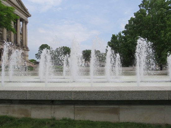 Rows of small fountains on a concrete platform raised a few feet above ground level.
