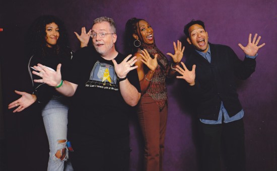 Us doing jazz hands with three Lower Decks cast members!