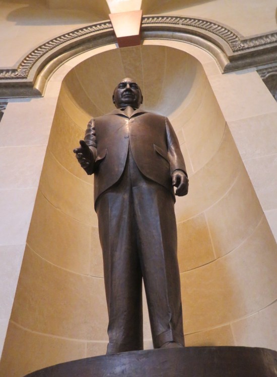 Statue of Richard J. Daley offering to shake your hand.