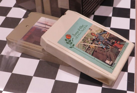 8-track tapes of Sonny & Cher's "All I Need Is You" and carole King's "Tapestry".