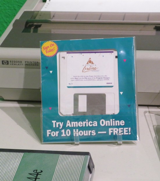 A 5-inch floppy disk promising 10 free hours of America Online.
