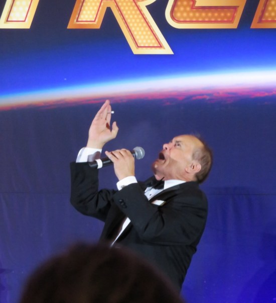 Jeffrey Combs on stage caterwauling at the ceiling, waving a lit cigarette and maybe convulsing.