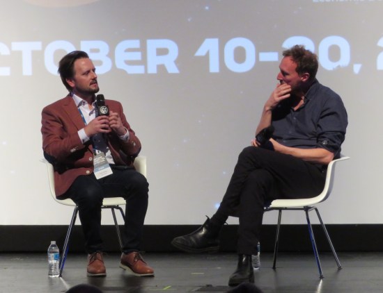 The interview continues, this time with the interviewer in better focus.