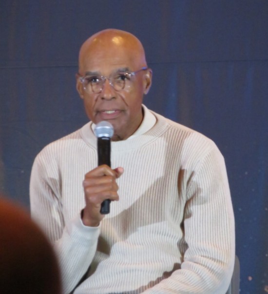 Michael Dorn answering a question onstage.
