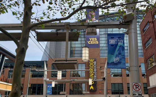 Welcome to Swift City banner hanging in front of the Fieldhouse. 