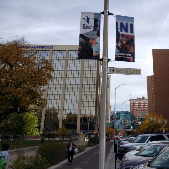 Swift Street sign along a bike path.