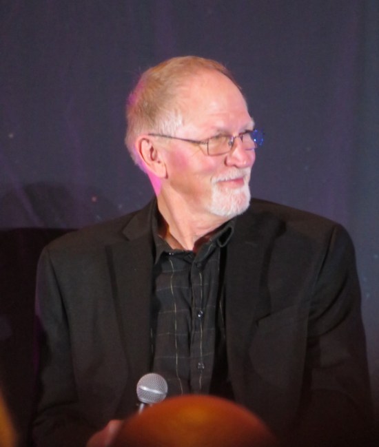 Vaughn Armstrong on stage looking dignified and happy.