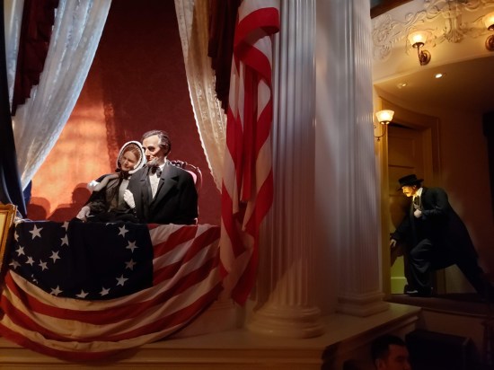 Replica of Ford's Theatre balcony, with the Lincolns watching the play below and Booth sneaking in the door behind them.