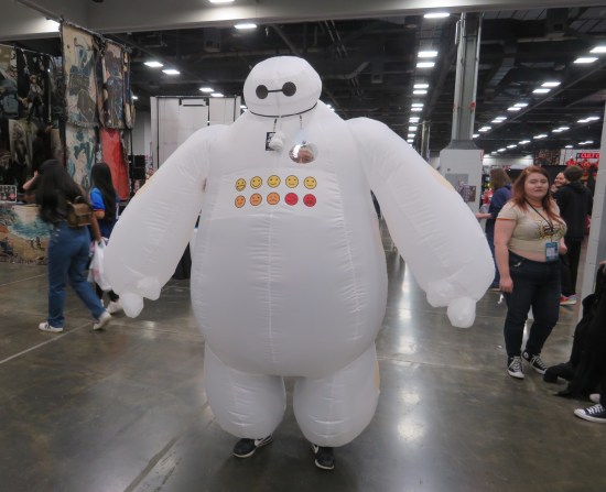 costume: giant inflatable spherical white robot suit.