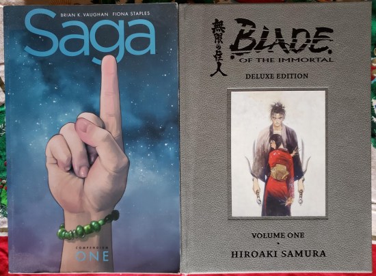 Copies of the eighth and ninth books on our list, each one a massive collection of many comics.