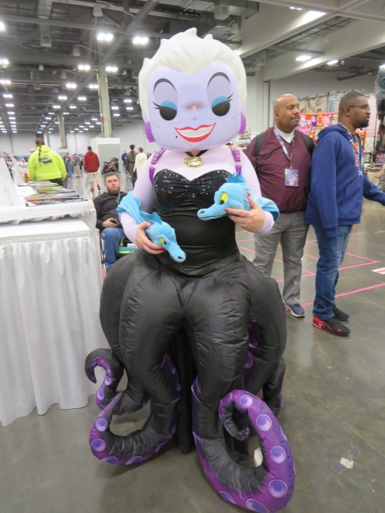 costume: inflatable Ursula from "The  Little Mermaid" with two eels around her waist.