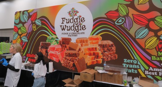 Fudgie Wudgie stand with two employees, fudge, and bragging about zero trans fats.