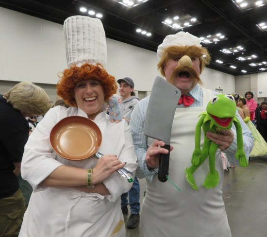 cosplay: Linguini and the Swedish Chef, with Remy and Kermit dolls and a copper frying pan.
