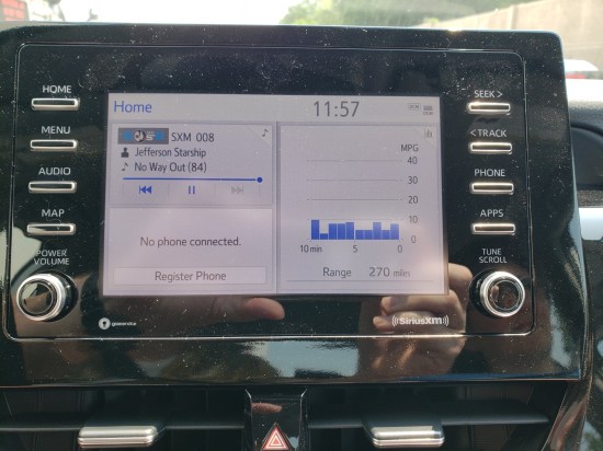 SiriiusXM car radio monitor shows it playing "No Way Out" by Starship. The MPG gauge shows us averaging a paltry 10 MPG or less for several minutes.