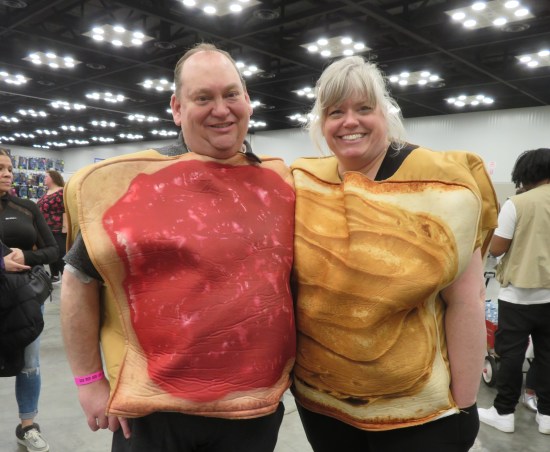 cosplay: husband in peanut butter bread suit and wife in jelly bread suit.