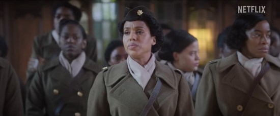Kerry Washington as a Black squad leader bringing her unarmed troops into an old building.