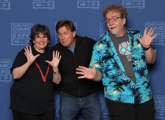 Us doing jazz hands while Emilio Esitevez kinda shrinks away from me and leans behind Anne.