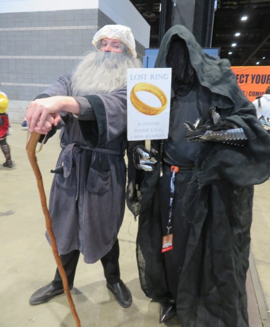 cosplay: Gandalf and the same sign-carrying Nazgul.