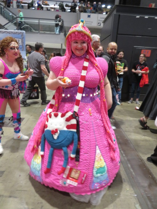 Crocheted Princess Bubblegum costume with fabulously poofy dress with a plush Finn attached to the front.