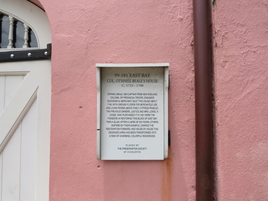 Lavender wall with sign detailing how Colonel Othneil Beale's 18th-century domestic bliss segued into slumhood for a time. Yes, the sign actually uses the word "slum".