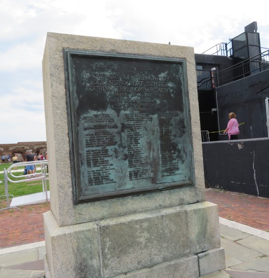 Fort Sumter large plaque on its own short monument marker. Main text: "In memory of the garrison defending Fort Sumter During the bombardment April 12-14, 1861."