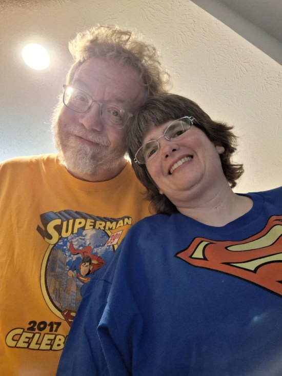 Selfie! Anne wears a blue T-shirt with a Superman S-shield. I'm wearing an orange Superman Celebration 2017 shirt with art by Jon Bogdanove.
