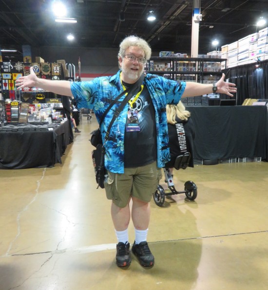 Me flapping my arms in the middle of a comic con with almost no one else around.