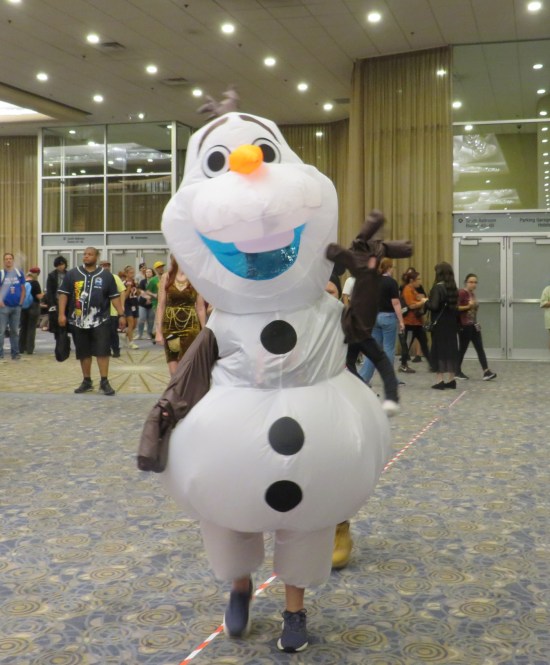 inflatable Olaf costume in a convention center ballroom.