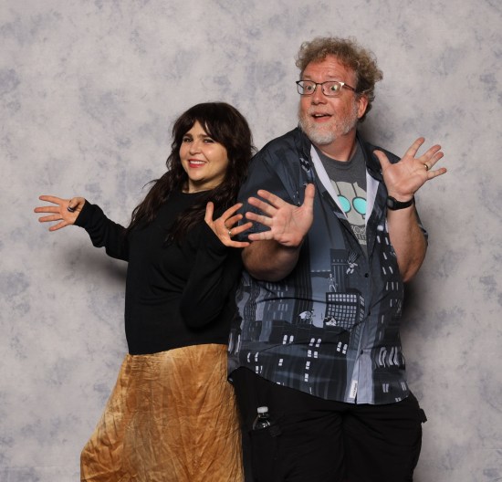 Me doing jazz hands with Mae Whitman, long-sleeved black top and long brown skirt.