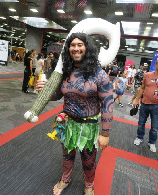 Maui cosplayer with giant hook.