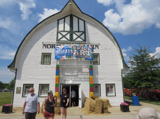 Normandy Barn with banner over door for the Brick Art Experience.