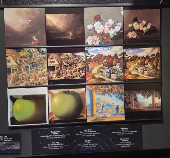 Six albums juxtaposed with the paintings their art came from. Of these, the only one I have is Tom Petty's "Into the Great Wide Open".