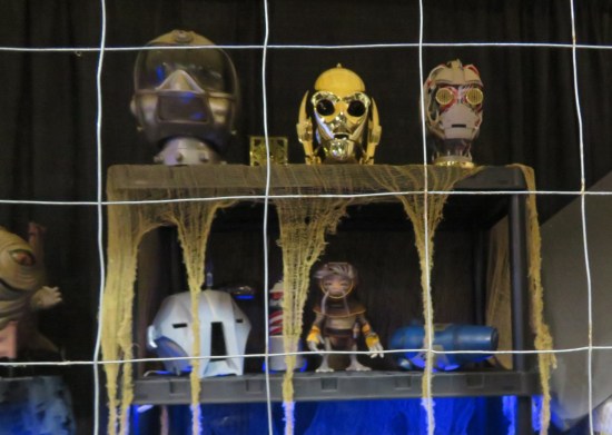 Cubbyholes with Star Wars masks and heads.