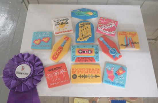 tray of cookies iced in honor of such songs as "Island in the Sun", Cool for the Summer", Walking on Sunshine", "Cruel Summer", "Surfin' USA", "Soak in the Sun" and more.