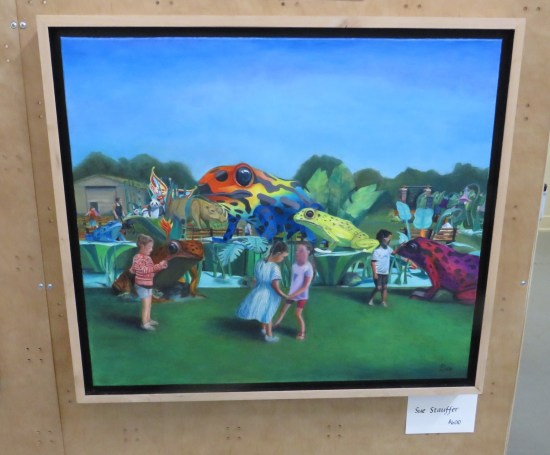 Painting of State Fair exhibit of giant colorful frog statues.