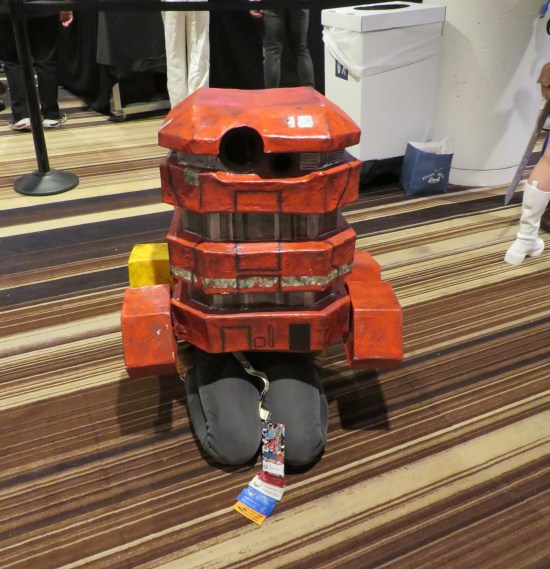 Young lady in B2EMO costume that only covers her upper body, so she kneeled down to simulate the droid's actual height.