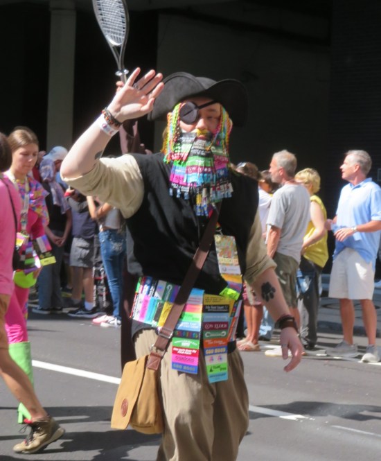 pirate costume with eyepatch and a beard made of badge ribbons.