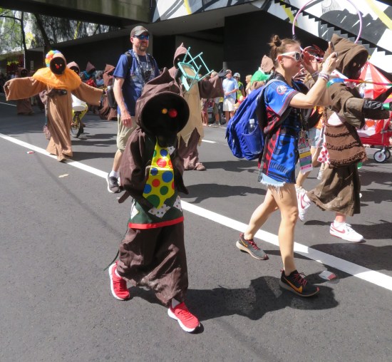 Jawa costume with big clown necktie.