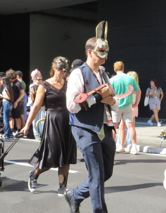 Bioshock NPC bad guys, bloodied and with rabbit masks.