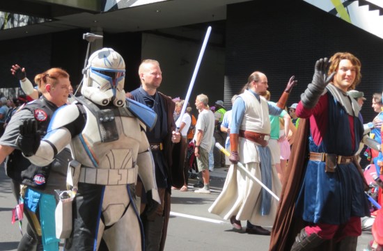Captain Rex and Anakin costumes marching.