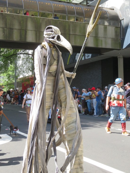 Khonshu cosplayer on stilts.