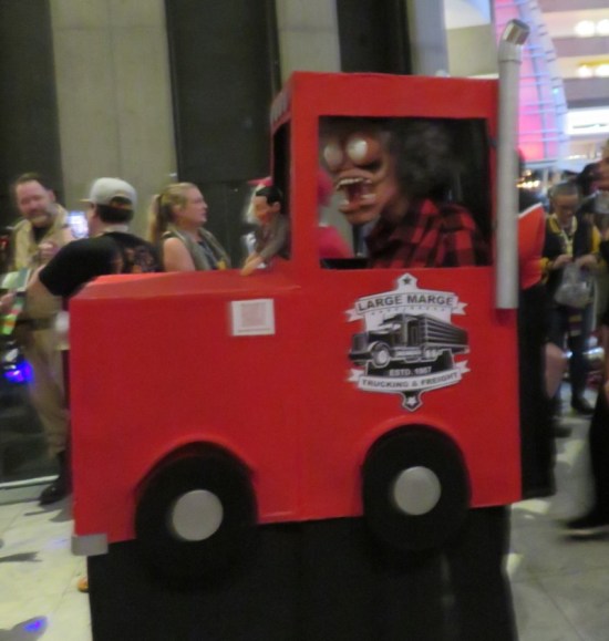 Large Marge costume, the quick claymation scene, walking around inside a big red kiddie truck.