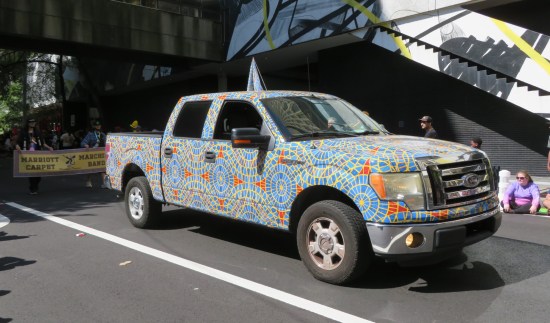 large truck painted all over with the Marriott Marquis' old, unique, inexplicable carpet pattern.