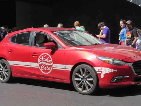 Red car with Nuka Cola logo.