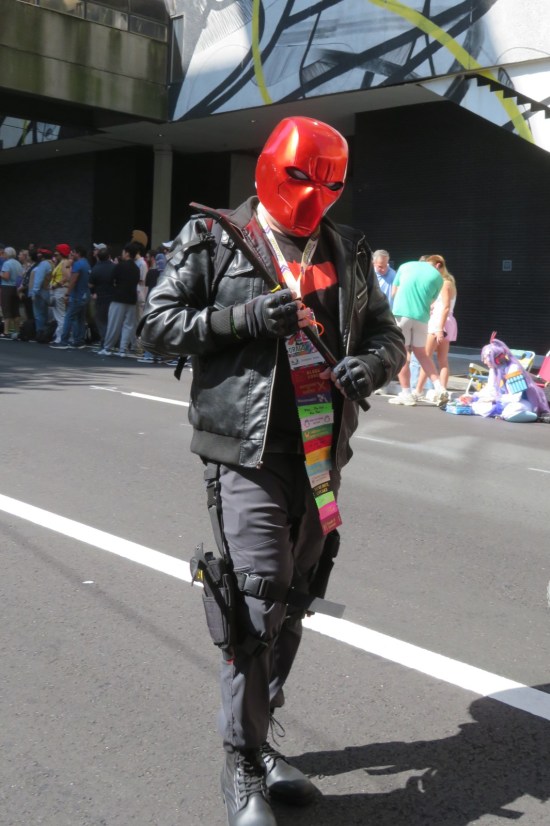 Red Hood cosplayer ready to punch.