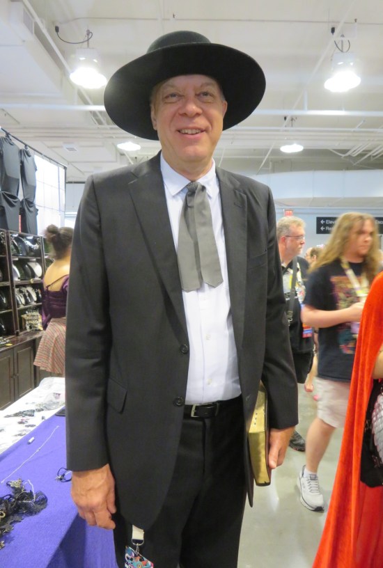 Evil pastor costume with Bible.