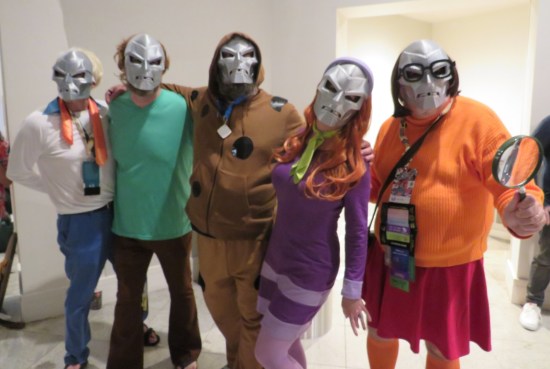 Five Scooby-Doo costumes but also wearing Doctor Doom masks.